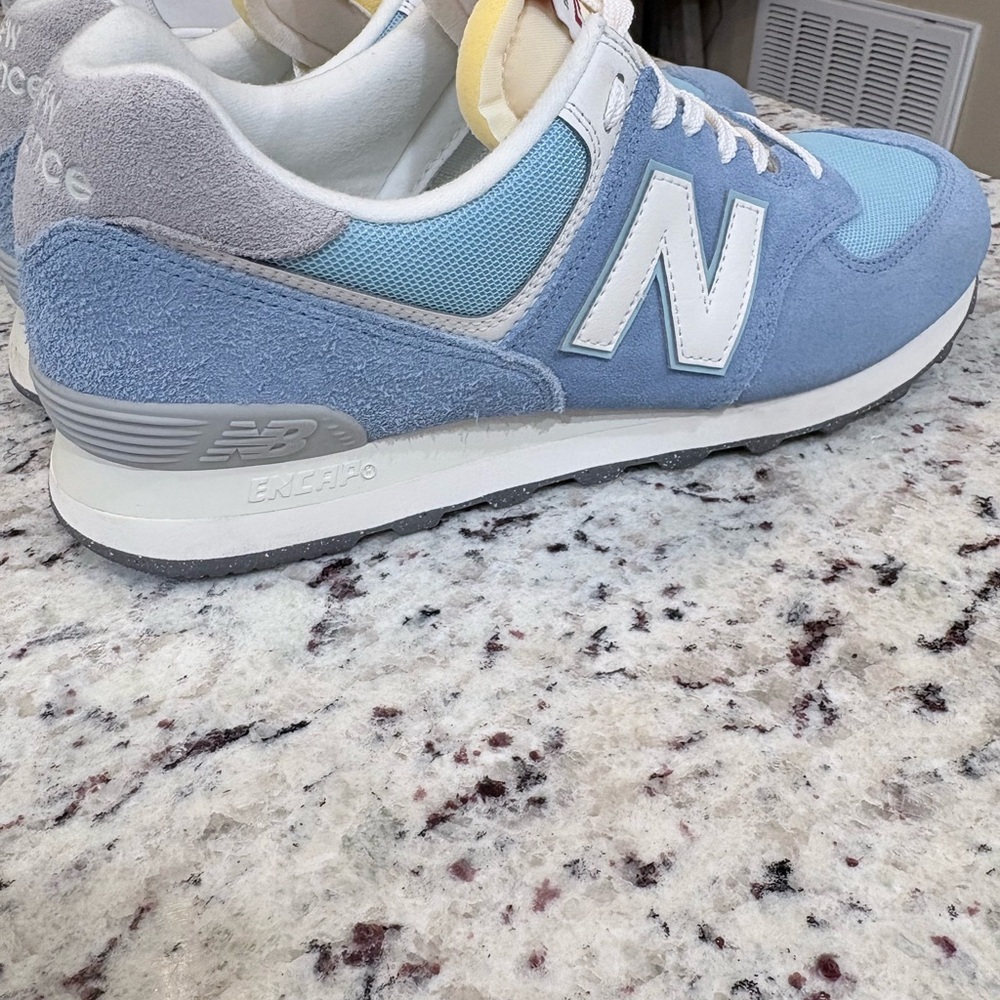 New Balance Light Blue and White Sneakers